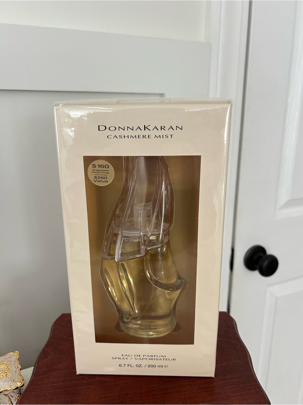 Donna Karan Cashmere Mist — Cream and Gold Perfume Bottle